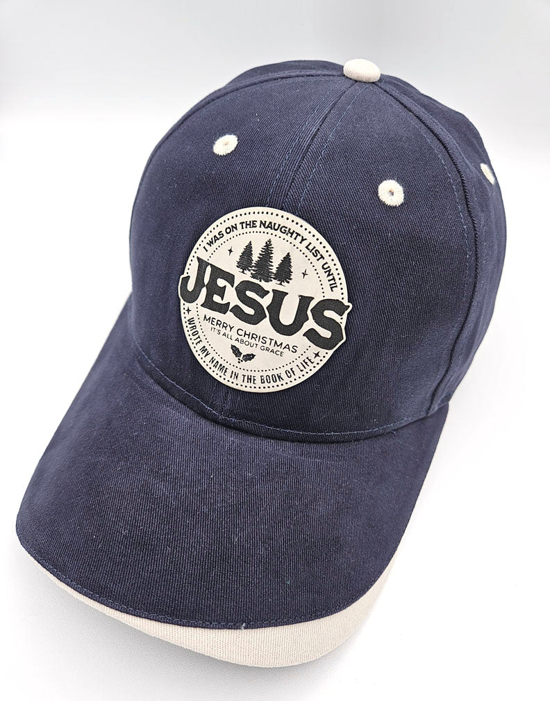 Christmas Cap: I Was on the Naughty List Until Jesus Wrote My Name in the Book of Life (Blue)