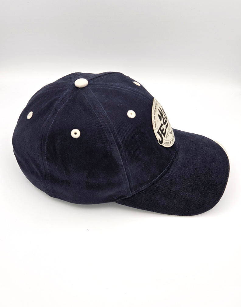 Christmas Cap: I Was on the Naughty List Until Jesus Wrote My Name in the Book of Life (Blue)