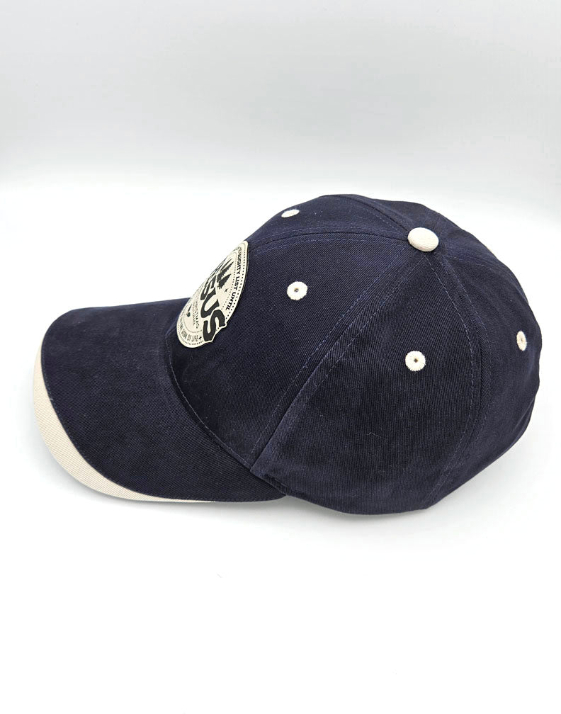 Christmas Cap: I Was on the Naughty List Until Jesus Wrote My Name in the Book of Life (Blue)